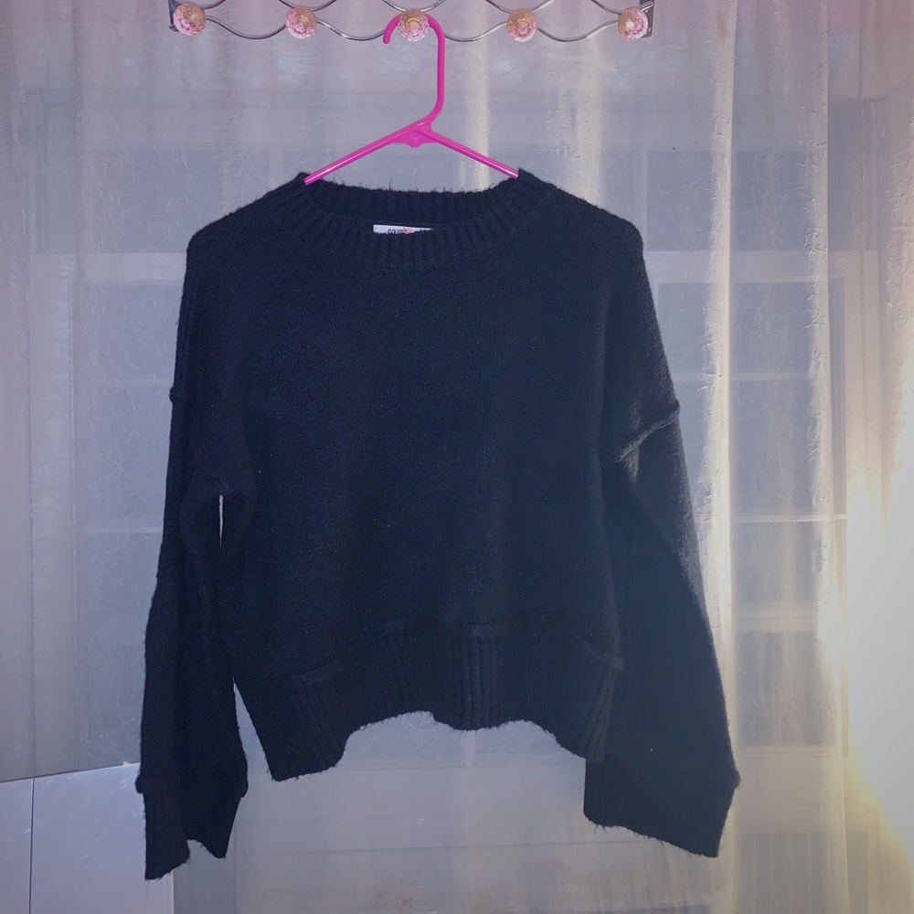 Black sweater with cute trim detailing!